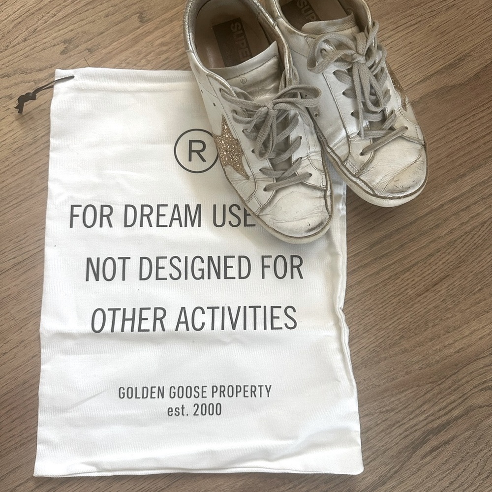 Lightly worn golden goose leather distressed sneakers
